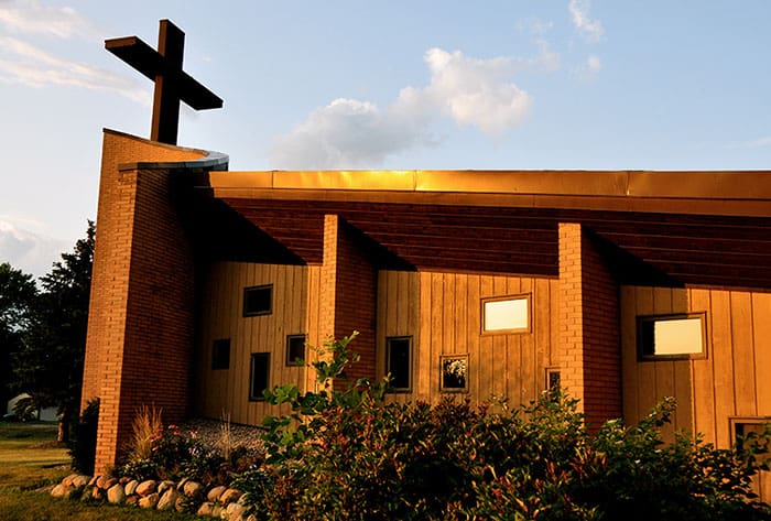 Welcome to Redeemer church building with cross